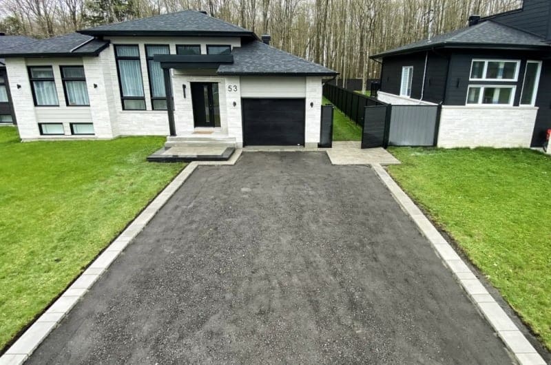 Faded driveway to rich black before