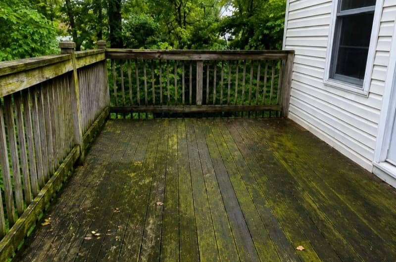 Grimy deck to clean wood before
